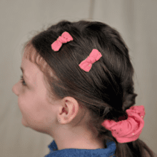 Barrettes clic-clac petits noeuds gaze pois or rose sorbet