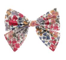 Barrette noeud papillon porcelaine rosée